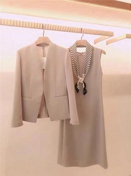 Женский костюм в стиле Chanel фото